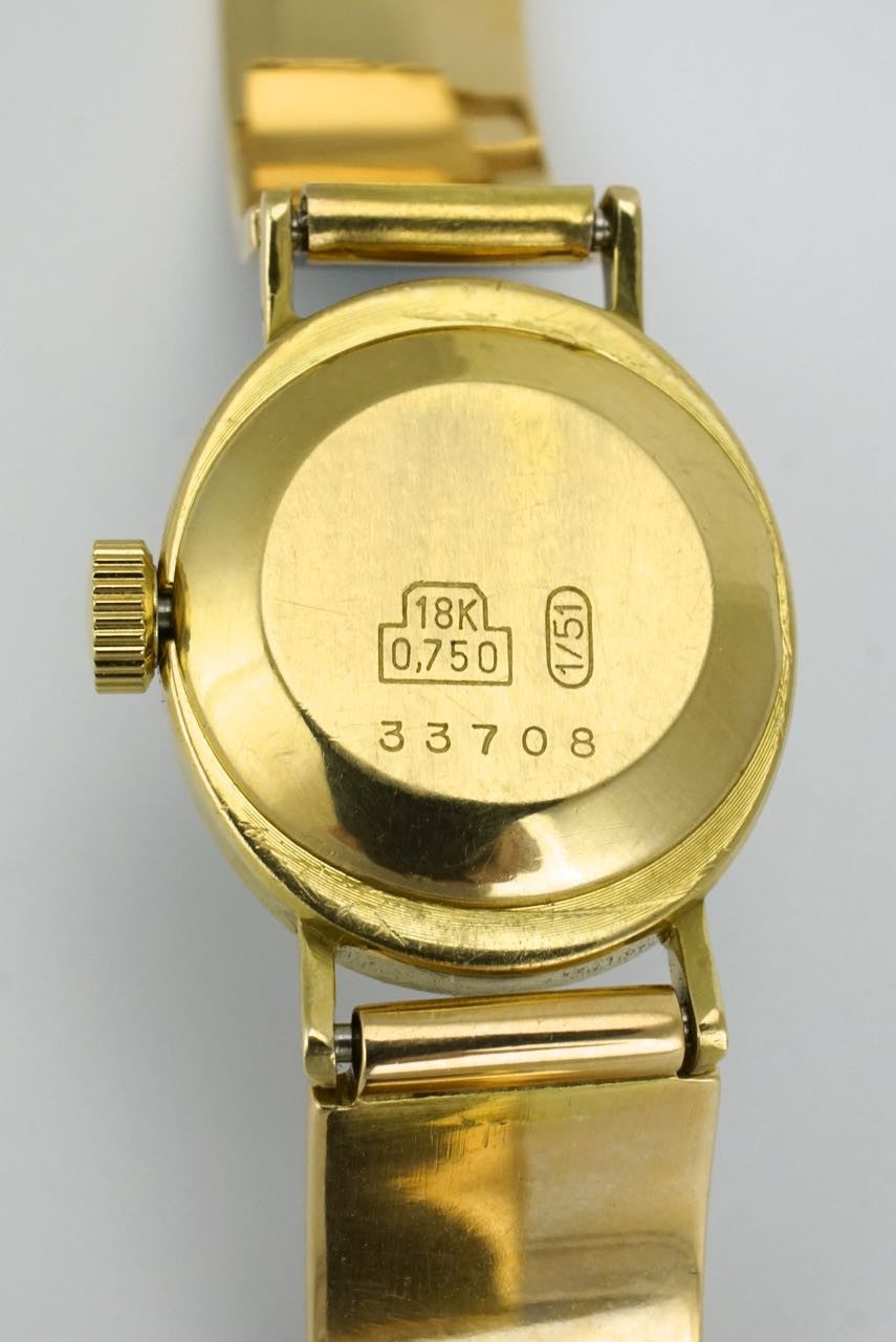 Gucci 18k yellow gold and blue enamel belt buckle bracelet watch