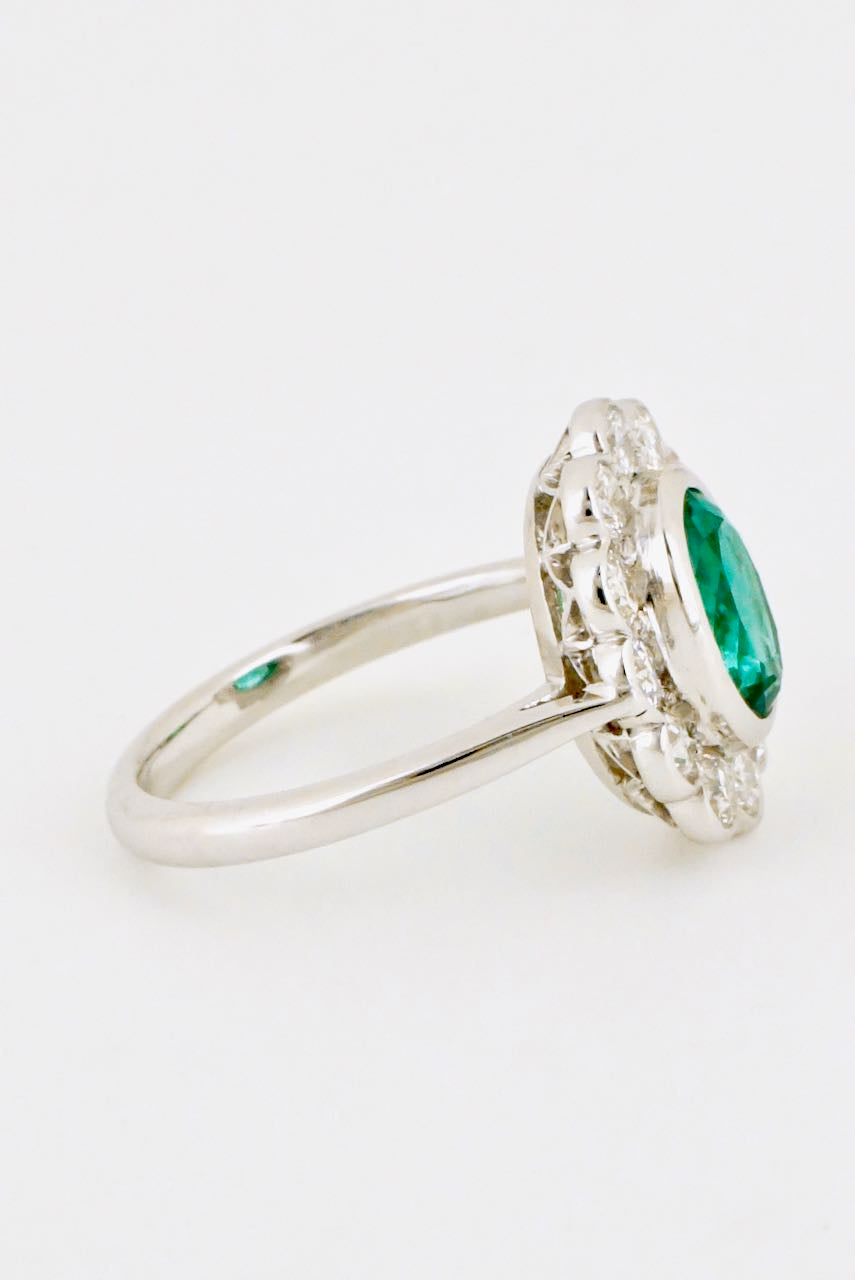 Vintage Platinum Emerald and Diamond Cluster Ring