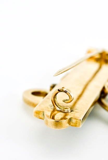 Antique gold diamond and black enamel key brooch