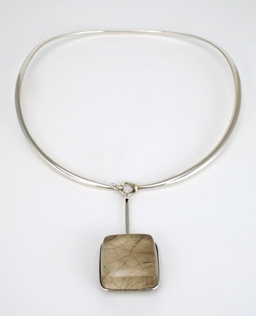Georg Jensen silver neck ring and rutilated quartz pendant design 410 Torun