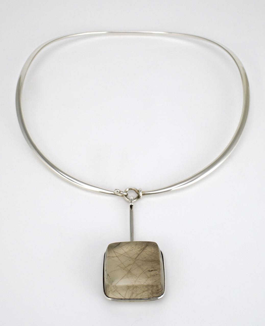 Georg Jensen silver neck ring and rutilated quartz pendant design 410 Torun