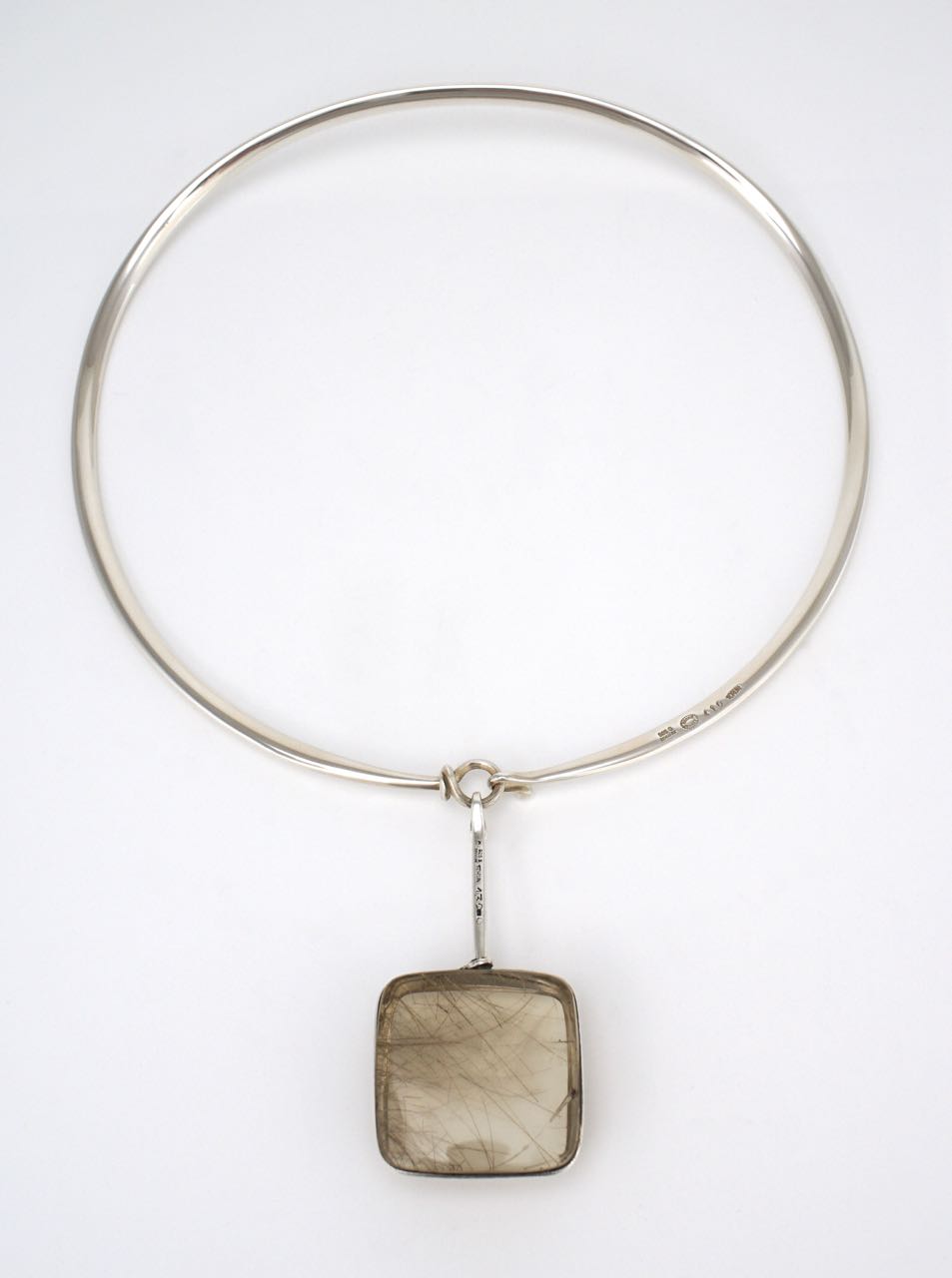 Georg Jensen silver neck ring and rutilated quartz pendant design 410 Torun