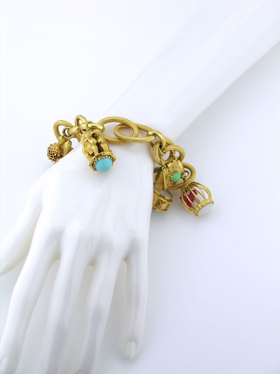 Opera Antiques Valletta - Circa 1960 vintage charm bracelet in 18ct yellow  gold having 1 charm vase with coral. Weighing 32 grams. With a round sprung  clasp and safety chain. #gold #goldcharmbracelet #