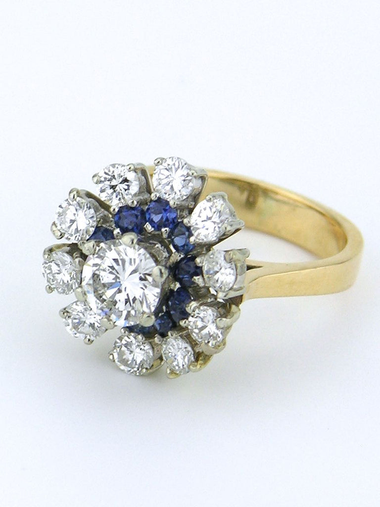 Diamond and sapphire daisy cluster ring