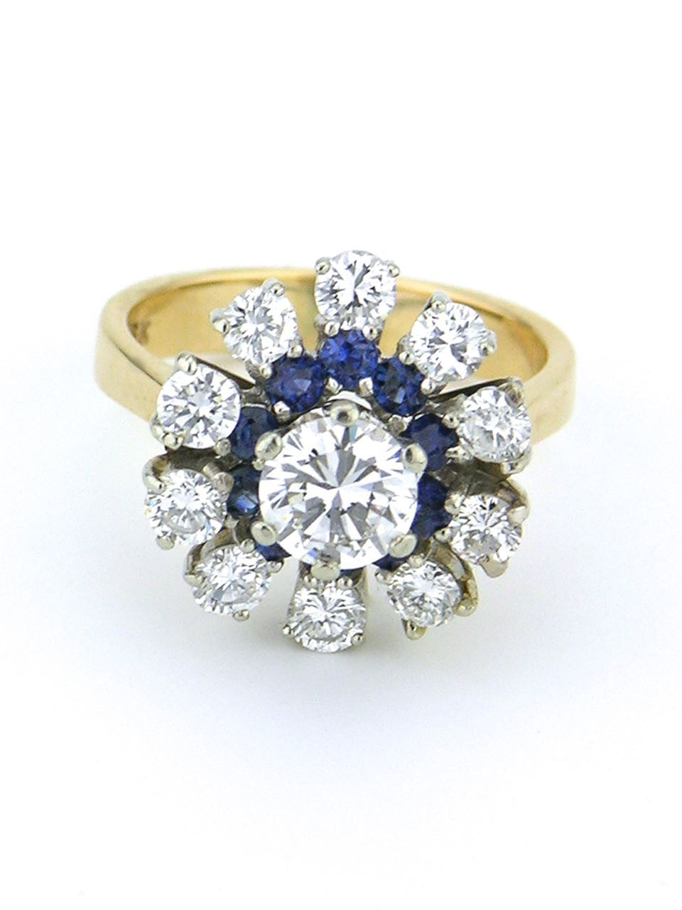 Diamond and sapphire daisy cluster ring