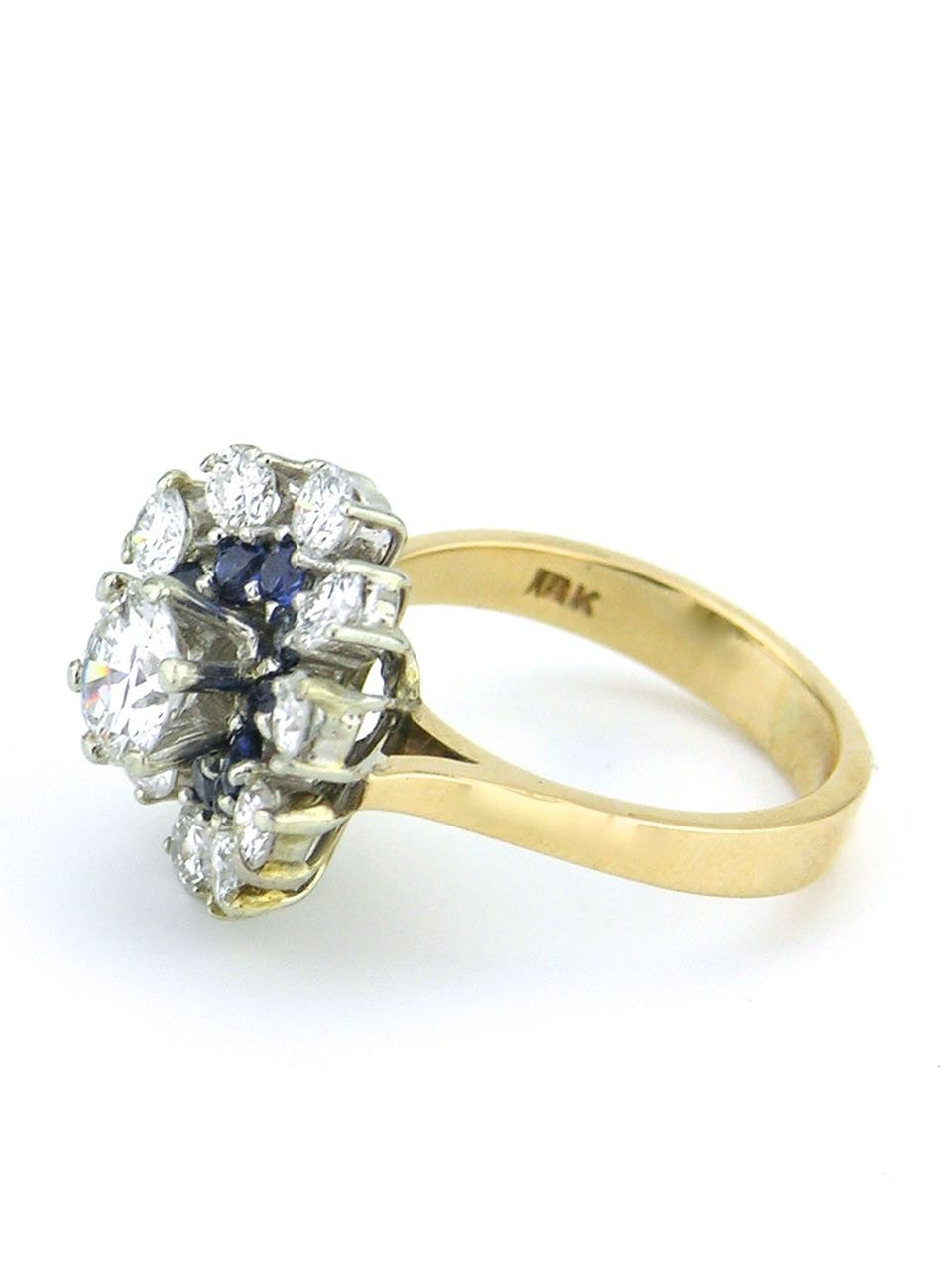 Diamond and sapphire daisy cluster ring