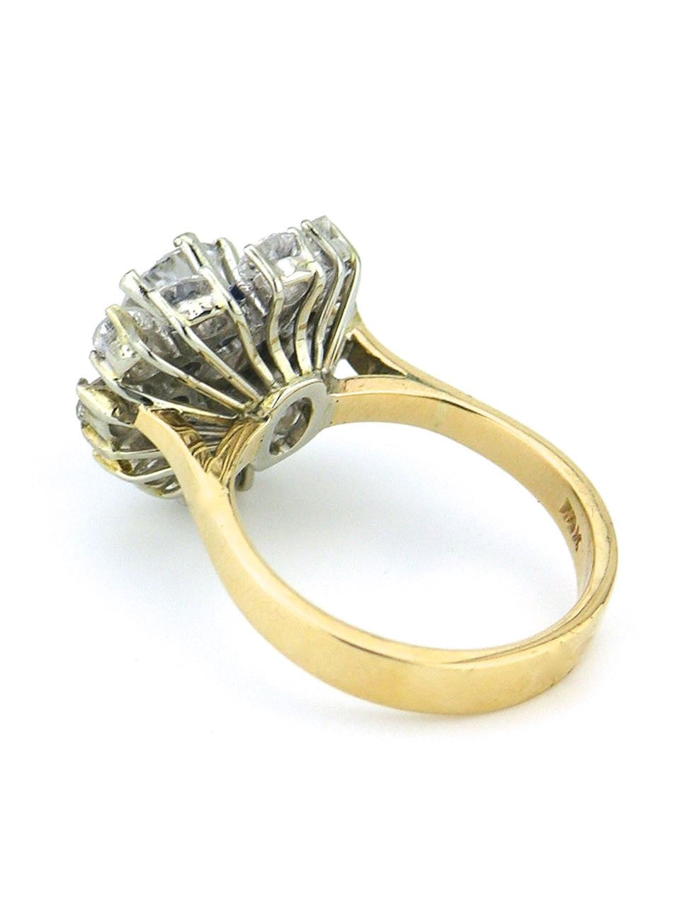 Diamond and sapphire daisy cluster ring