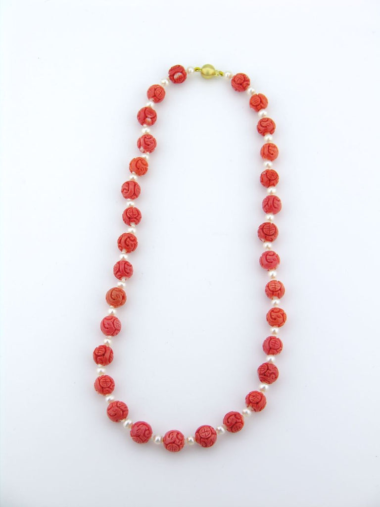 Carved Momo coral bead and pearl necklace