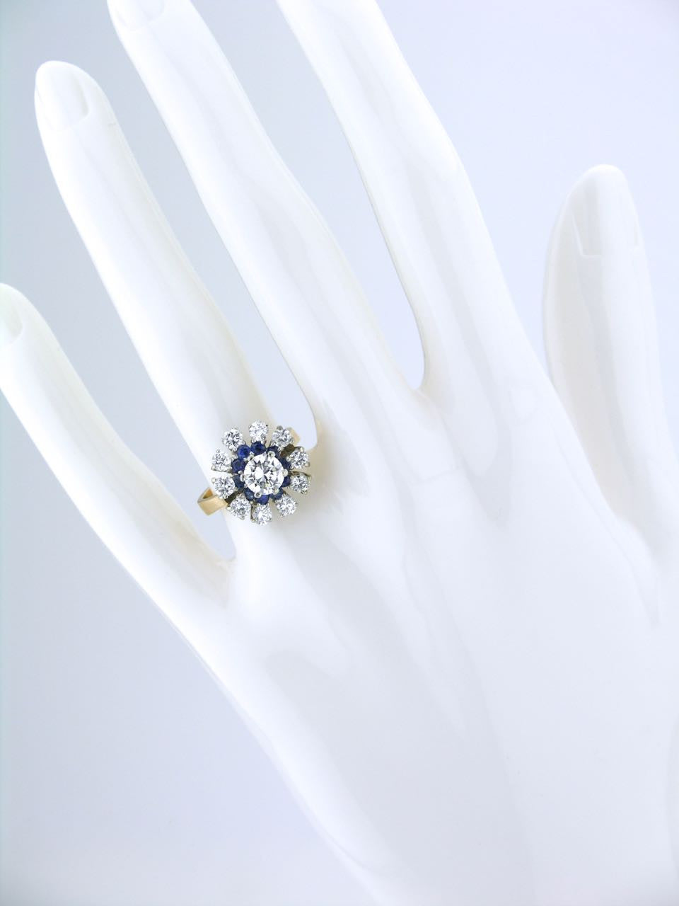 Diamond and sapphire daisy cluster ring