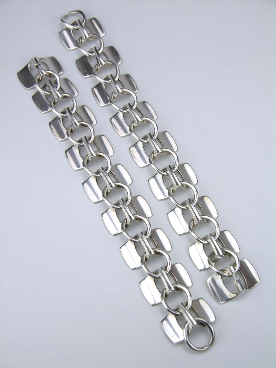 Alton pair of solid silver architectural bracelets that also form a necklace