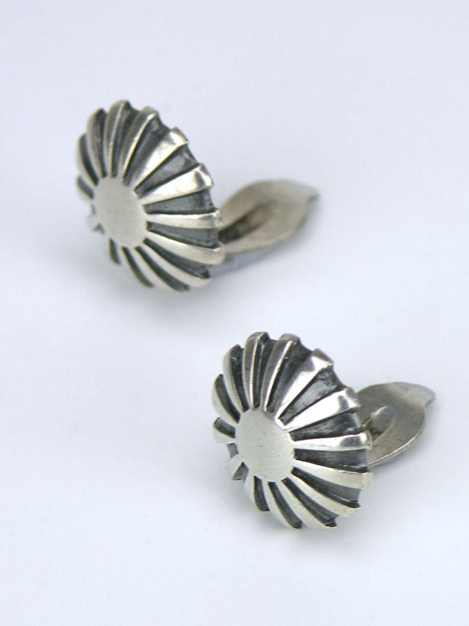 Just Andersen silver sunray clip earrings