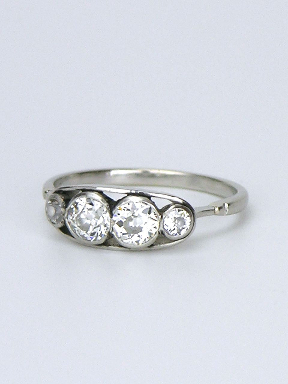 Platinum and diamond four stone ring