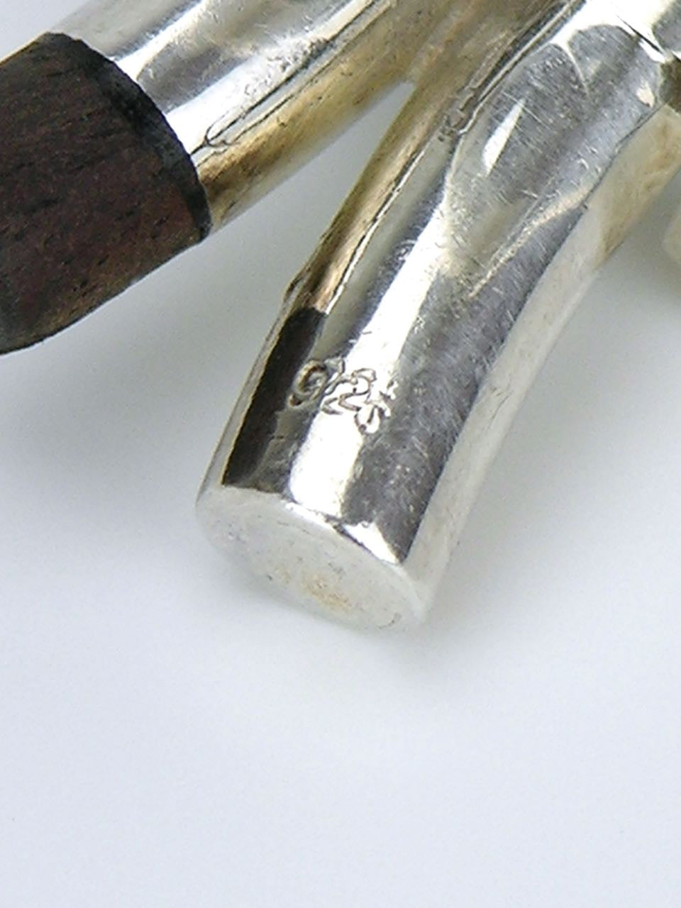 Solid silver and ebony "X" ring