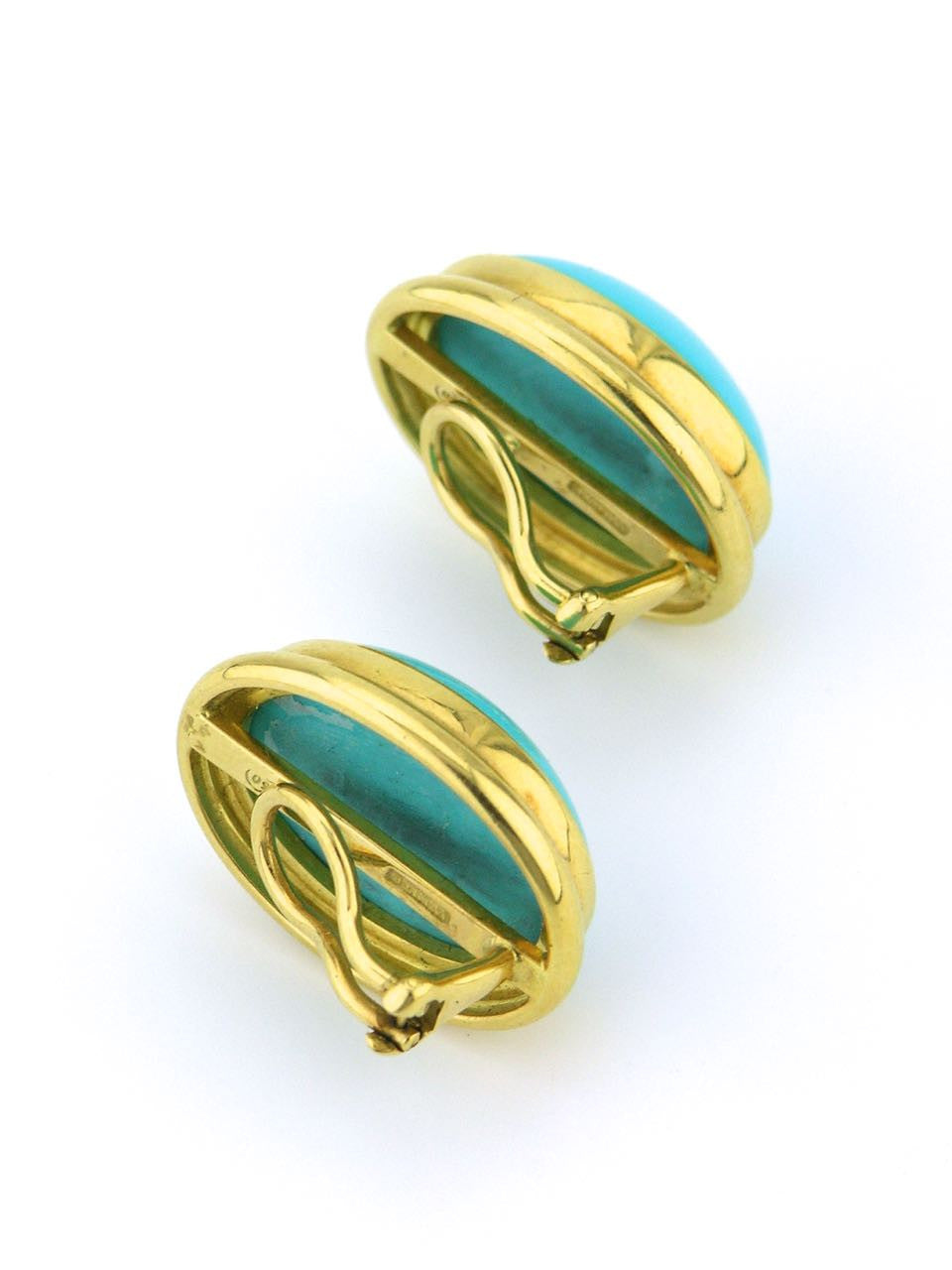 Tony White oval turquoise and gold clip earrings